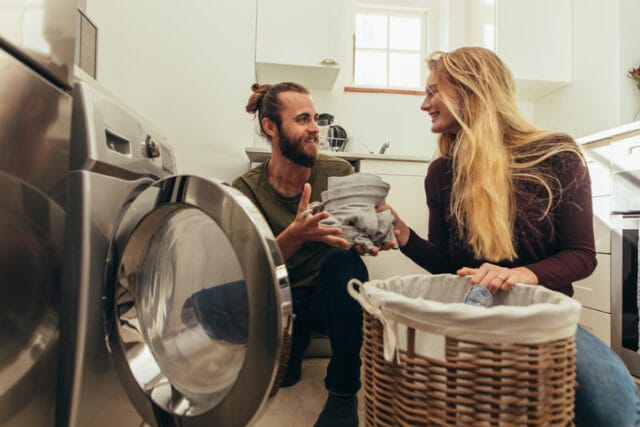 couple doing laundry together
