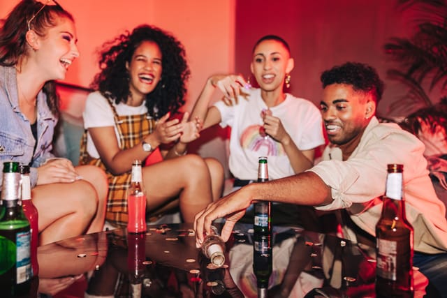 friends playing games at house party