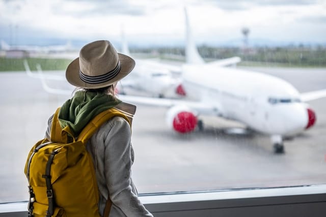 female traveler at airport departure