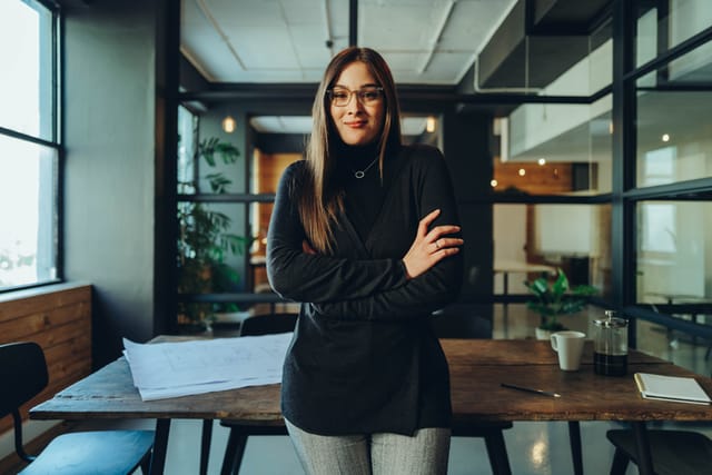 smart young businesswoman crossed arms