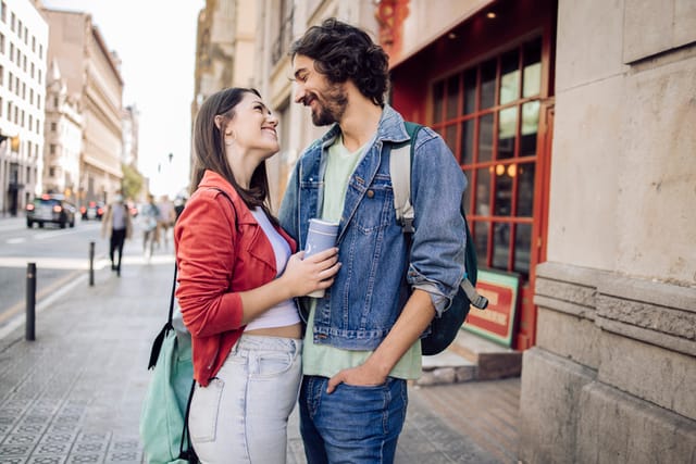 hipster couple looking romantic on street