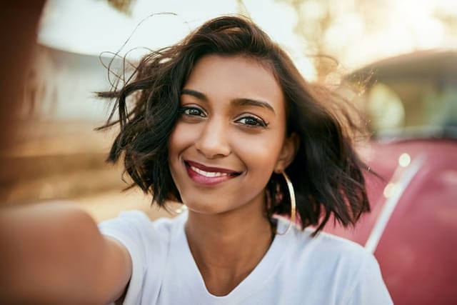 beautiful woman smiling in selfie
