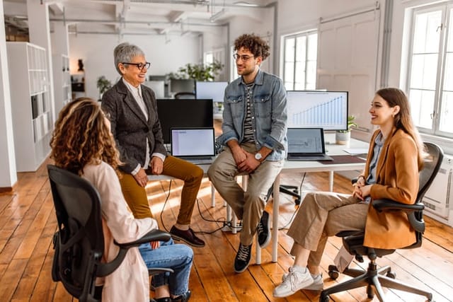 millennial colleagues in office meeting