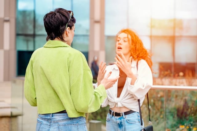 angry unhappy friends having public argument
