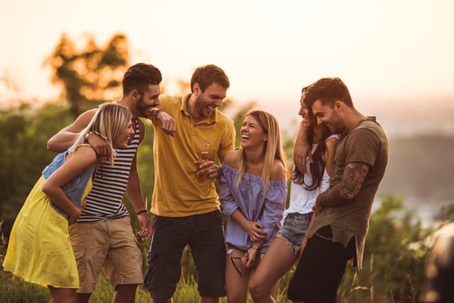Shot of a group of friends hanging out on their vacation.