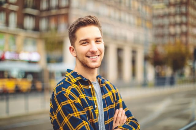 smiling man portrait outdoors