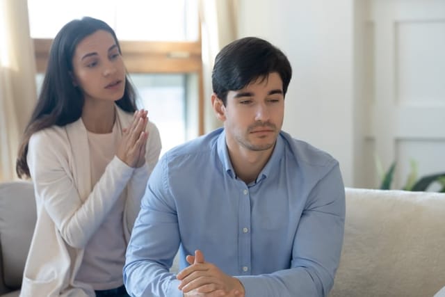 Desperate young caucasian woman ask forgiveness reconcile with determined upset husband after cheating, loving millennial wife make peace with stubborn unhappy man, relationships problem concept