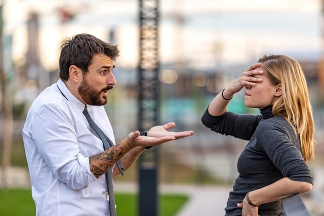 Handsome Young Man is Trying to Solve Relationship Problems with his Beautiful Girlfriend with Long Hair while Taking a Walk and Having a Harsh Conversation During Sunset Near the River.