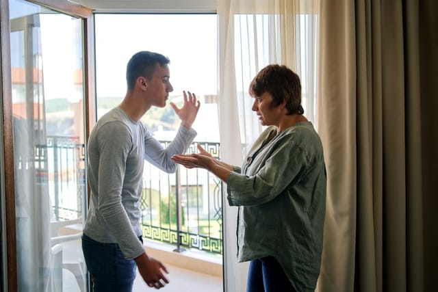 Mother Arguing With Teenage Son At Home