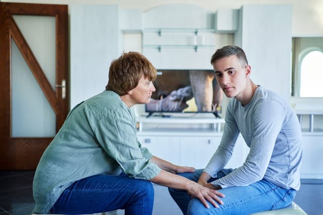 Teenage boy at home.