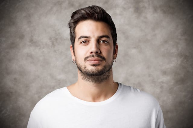 serious man portrait with background