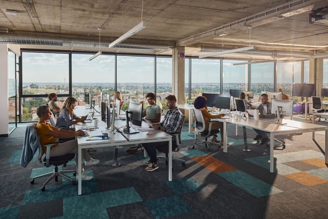colleagues in open-floor ofice