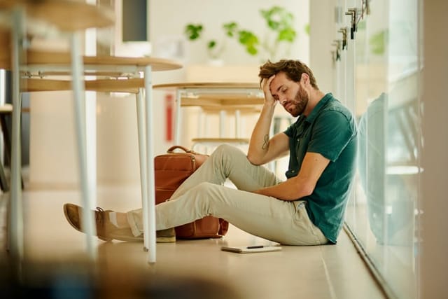 Stress, depression or burnout teacher on school floor with