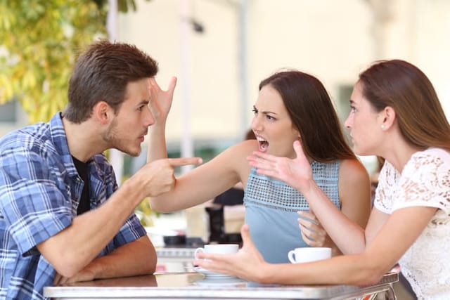 Discussion of three angry friends arguing in a coffee shop