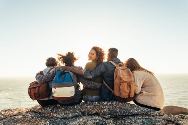 happy woman with friends on adventure
