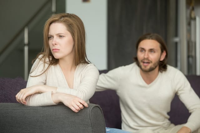 Unhappy young couple.