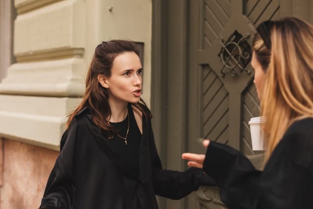 friends arguing outside