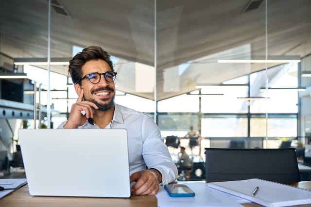 Man sitting at his desk.