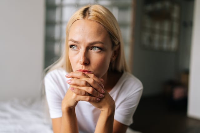 A woman realizing she's in an unstable relationship.