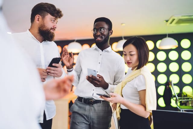 colleagues on their phones