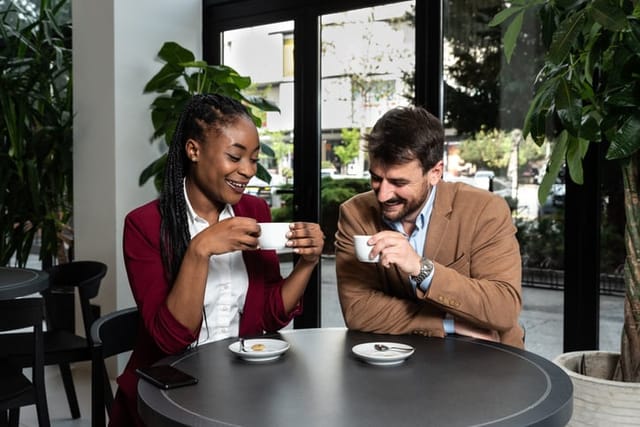 co-workers having coffee together