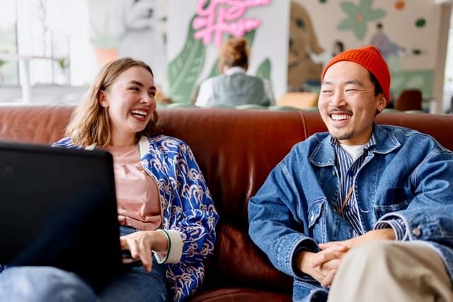 flirty couple chatting on couch