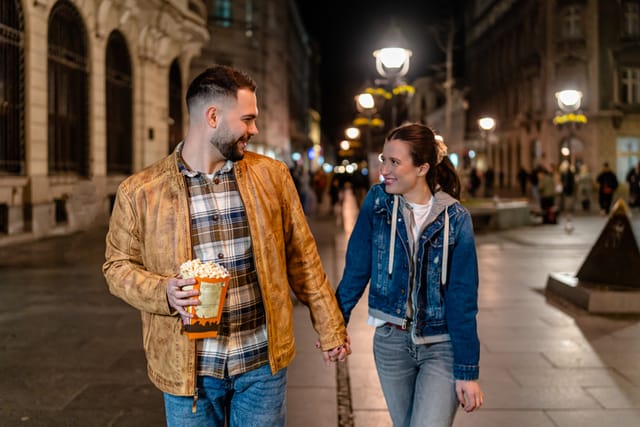 couple holding hands after a date