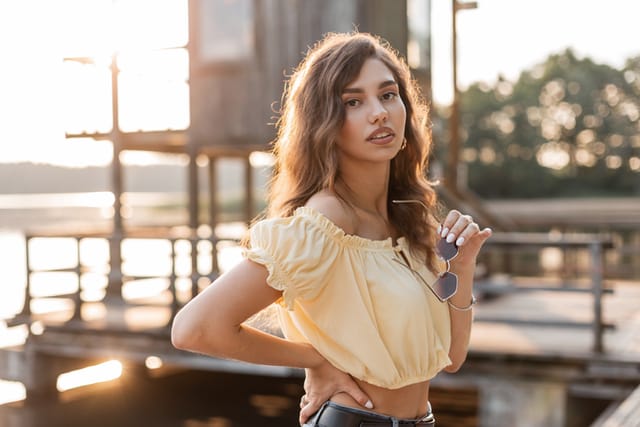 beautiful young woman outdoors sunset
