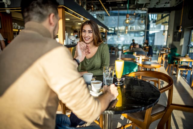 millennial couple on romantic dinner date