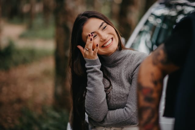embarrassed young woman smiling