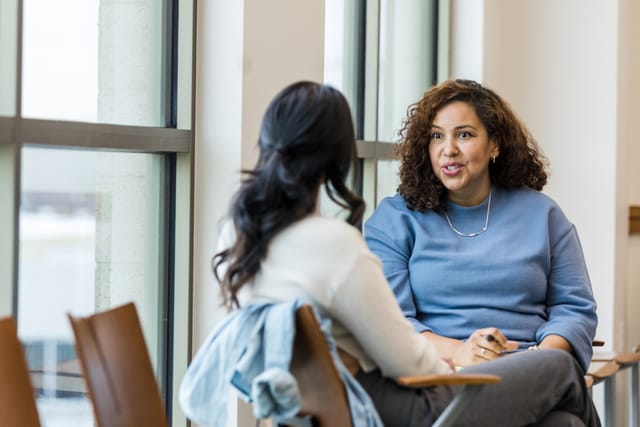 two friends having serious conversation