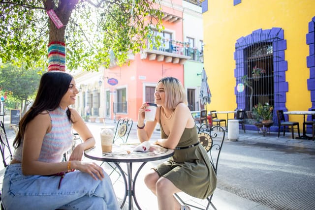 two friends at outdoor cafe