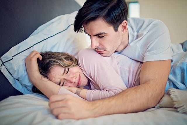 Man is trying to calm his crying girlfriend.