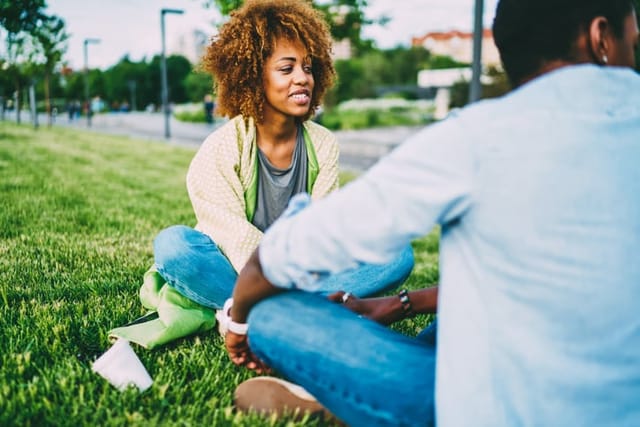 woman looking away at grass