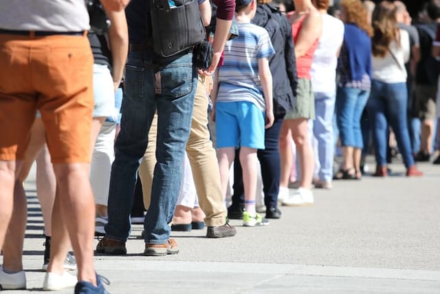 standing in a long line