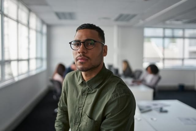serious man sitting in office