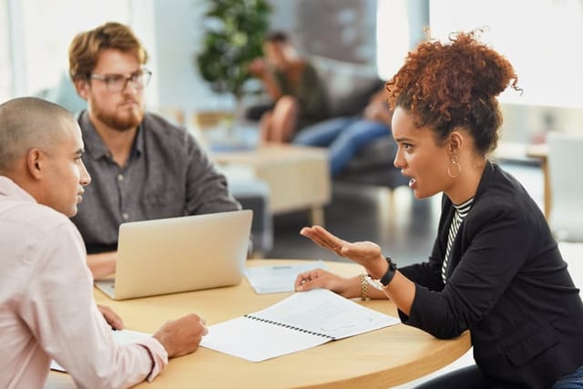 colleagues arguing in office