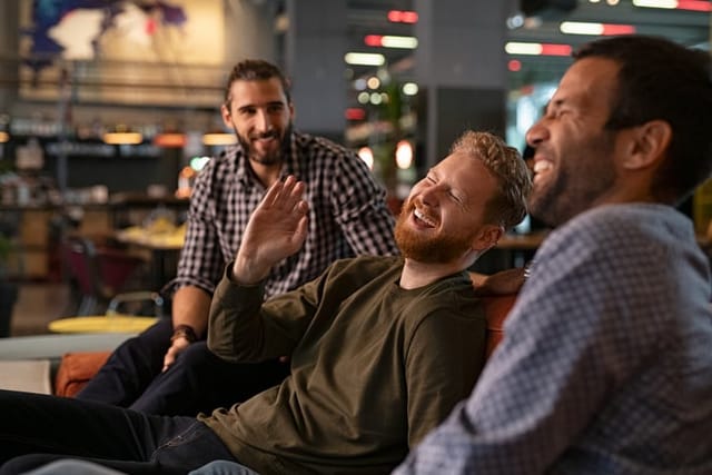 guys hanging out laughing