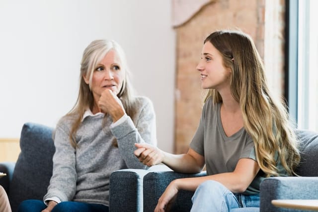 Mom and daughter having a chat.