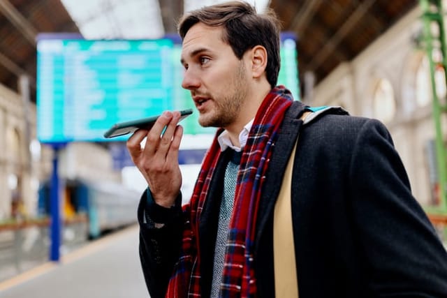 Man sending voice message.