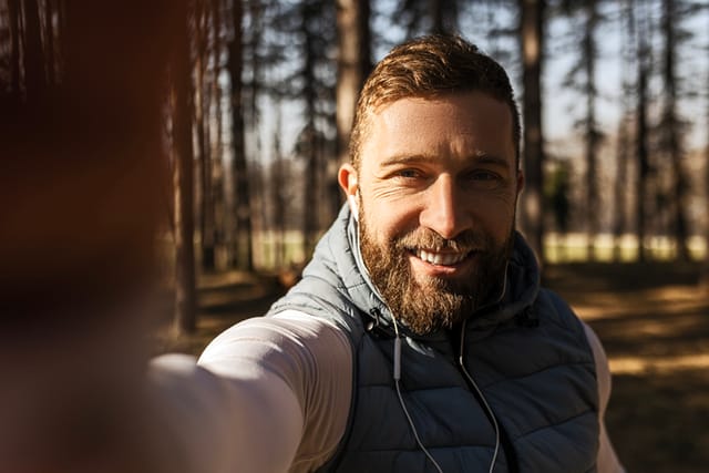 young runner taking selfie