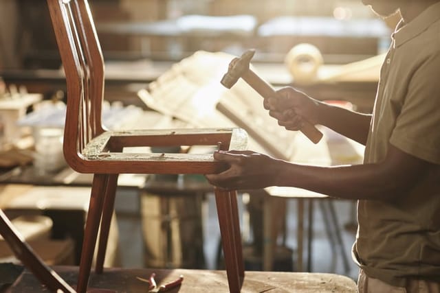 guy building chair