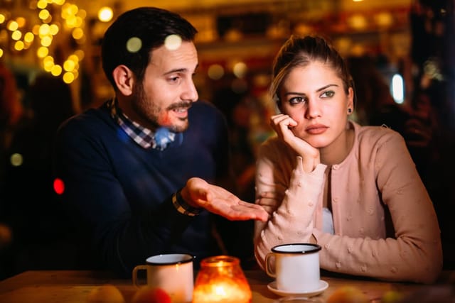 Sad couple having a conflict and relationship problems