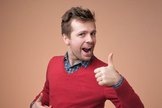 Man giving a thumbs up.