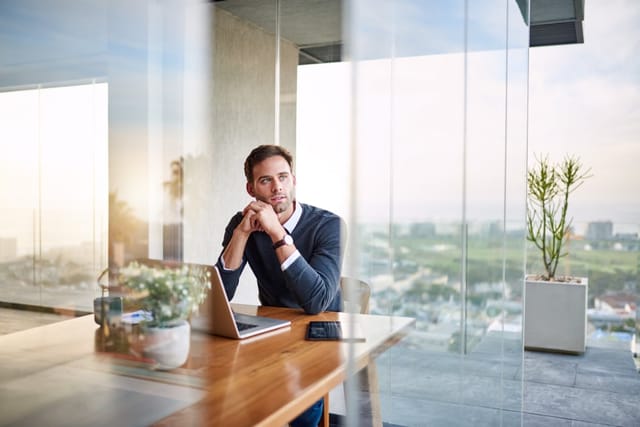 Man in his office.
