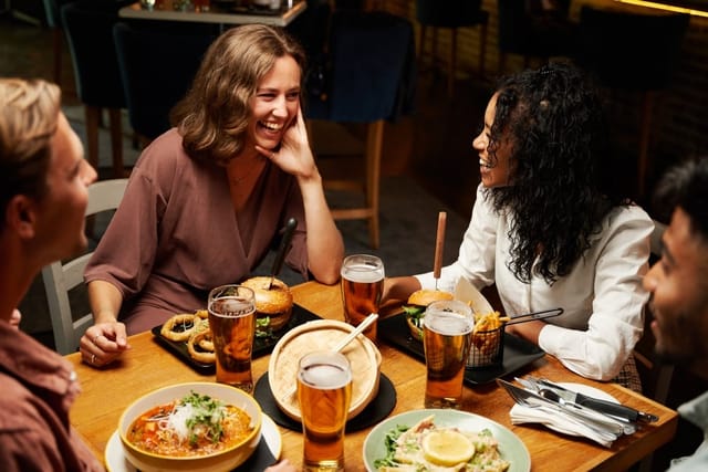 Friends having dinner together.