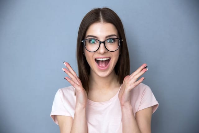 Young woman wearing glasses.
