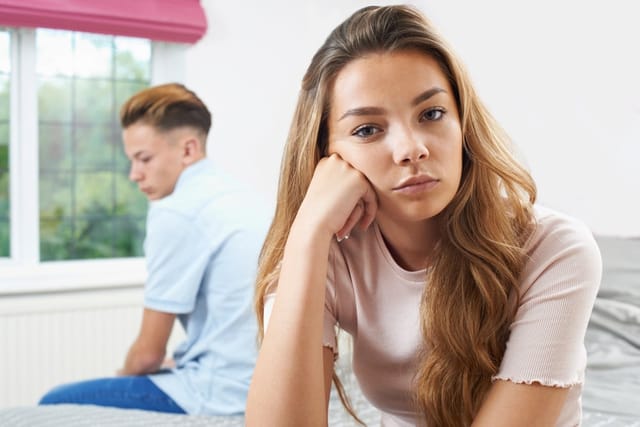 Teenage couple in an argument.