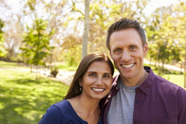 Happy couple on a walk together.