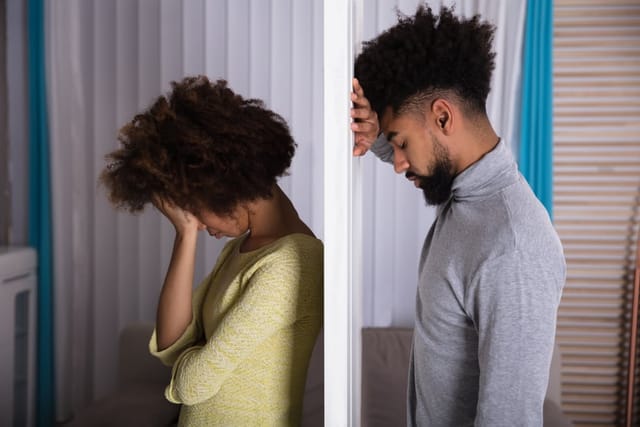 Young couple having a sad conversation.